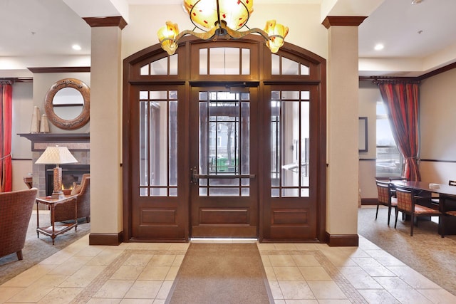 301 Clifton Ave Unit 1K, Minneapolis, MN 55403 - entrance foyer featuring inlaid floor details, baseboards, recessed lighting, and healthy amount of natural light