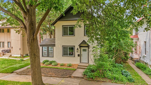 2808 32nd Ave S, Minneapolis, MN 55406 - view of front of home with stucco siding and entry steps
