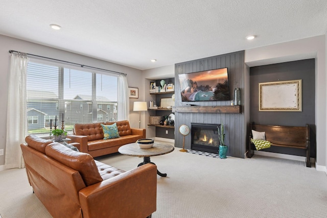 515 Goldenrod Trl, Waconia, MN 55387 - carpeted living area with a fireplace, baseboards, recessed lighting, and a textured ceiling