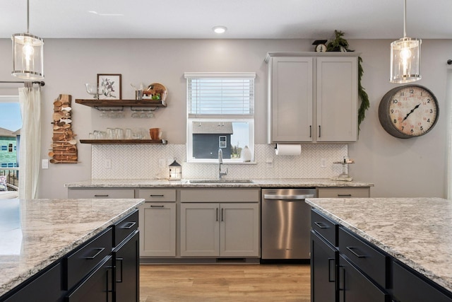515 Goldenrod Trl, Waconia, MN 55387 - kitchen with dishwasher, a sink, plenty of natural light, light wood-style flooring, and recessed lighting