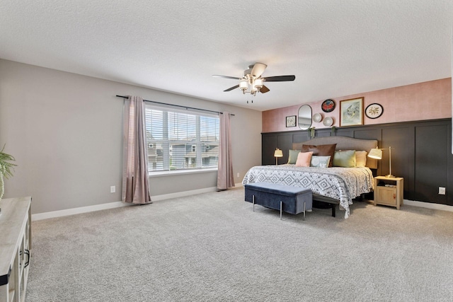 515 Goldenrod Trl, Waconia, MN 55387 - bedroom with light carpet, a textured ceiling, ceiling fan, and baseboards