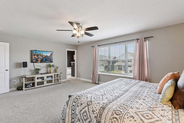 515 Goldenrod Trl, Waconia, MN 55387 - carpeted bedroom with baseboards, a ceiling fan, and a textured ceiling