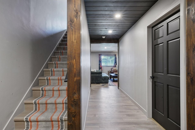 515 Goldenrod Trl, Waconia, MN 55387 - corridor featuring light wood finished floors, stairway, baseboards, recessed lighting, and wood ceiling
