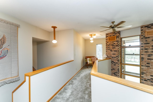 8706 Town Hall Rd NW, Byron, MN 55920 - hall with an upstairs landing, carpet, and baseboards
