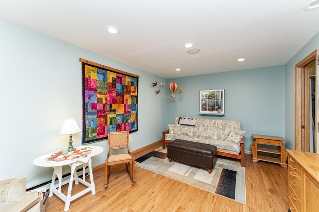 8706 Town Hall Rd NW, Byron, MN 55920 - living room with light wood-type flooring, baseboards, and recessed lighting
