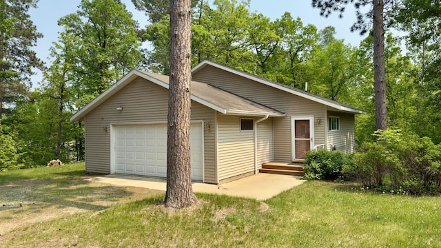 21341 County 50, Park Rapids, MN 56470 - view of front of property with a front yard, driveway, and a garage