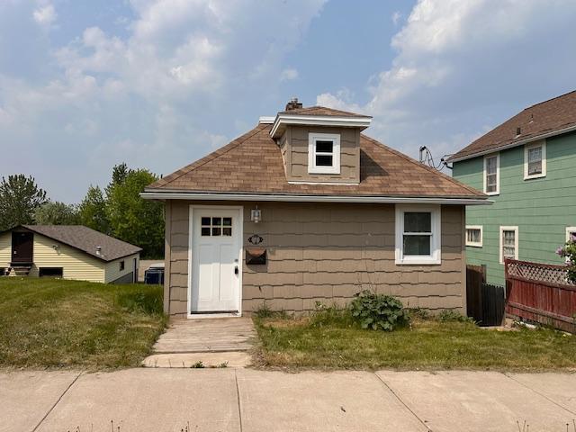 7 Shagawa Rd, Ely, MN 55731 - rear view of house featuring a shingled roof