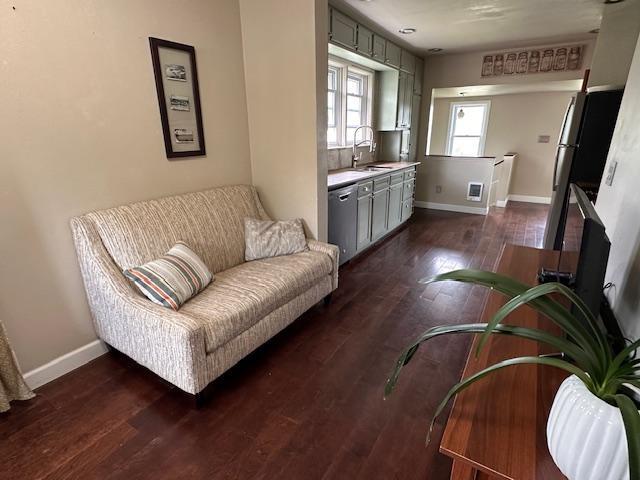 7 Shagawa Rd, Ely, MN 55731 - sitting room featuring dark wood finished floors and baseboards
