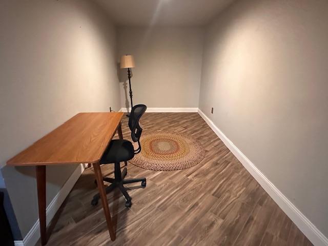 7 Shagawa Rd, Ely, MN 55731 - office area featuring baseboards and wood finished floors