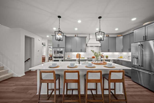 14810 106th Ave N, Maple Grove, MN 55369 - kitchen with stainless steel appliances, premium range hood, gray cabinets, light countertops, and recessed lighting