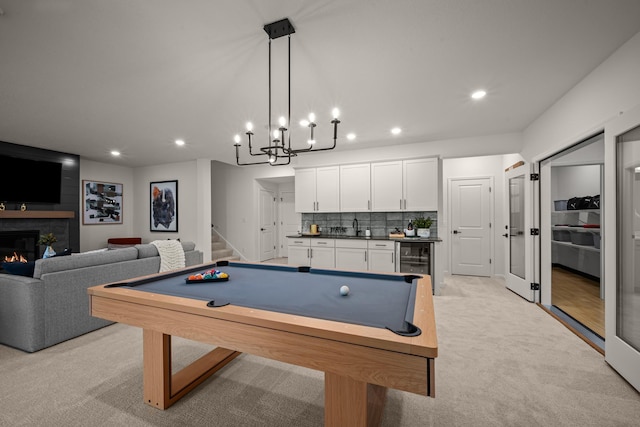 14810 106th Ave N, Maple Grove, MN 55369 - rec room with beverage cooler, wet bar, light colored carpet, recessed lighting, and a fireplace