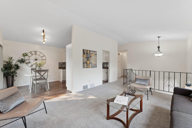 583 97th Ln NE, Blaine, MN 55434 - living room featuring carpet flooring and lofted ceiling