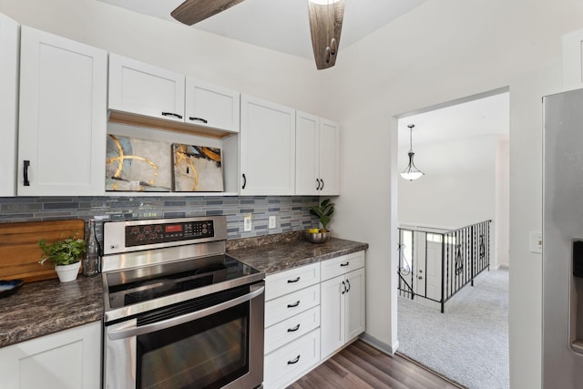 583 97th Ln NE, Blaine, MN 55434 - kitchen featuring stainless steel range with electric stovetop, white cabinets, decorative backsplash, ceiling fan, and dark wood finished floors