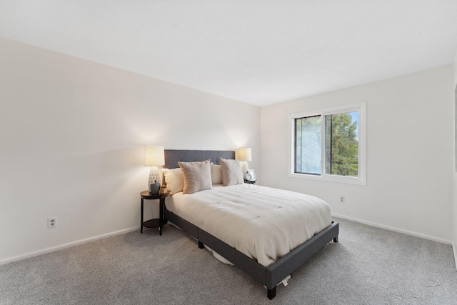 583 97th Ln NE, Blaine, MN 55434 - carpeted bedroom featuring baseboards