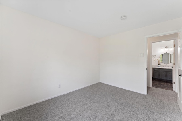 583 97th Ln NE, Blaine, MN 55434 - unfurnished room with carpet flooring, a smoke detector, and baseboards