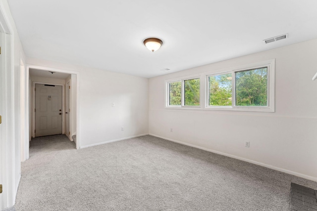 583 97th Ln NE, Blaine, MN 55434 - carpeted spare room featuring baseboards