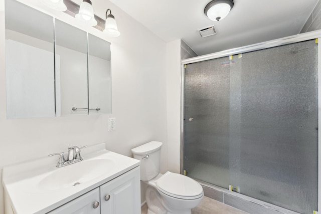583 97th Ln NE, Blaine, MN 55434 - full bath with toilet, vanity, and a shower stall