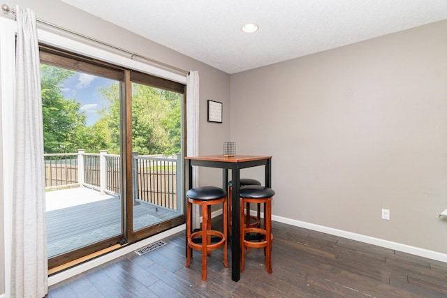 414 Bremen Pass, Waverly, MN 55390 - dining area featuring baseboards, recessed lighting, and dark wood-type flooring