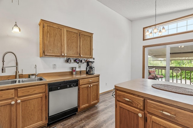 1977 Granite Ave N, Oakdale, MN 55128 - kitchen with dishwasher, a sink, dark wood finished floors, a textured ceiling, and brown cabinetry