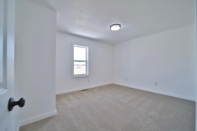 32736 203rd Ave, Clarissa, MN 56440 - unfurnished room featuring carpet flooring and a textured ceiling