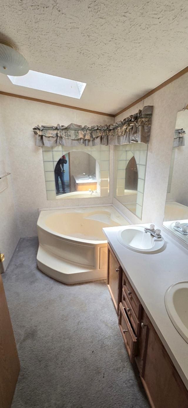 68005 County Road 3, Bandon Twp, MN 55332 - full bath featuring a textured ceiling, double vanity, a bath, a skylight, and ornamental molding