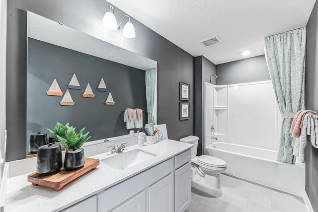 8018 Marquette Ave NE, Otsego, MN 55330 - full bath featuring vanity, toilet, bathtub / shower combination, a textured ceiling, and tile patterned floors