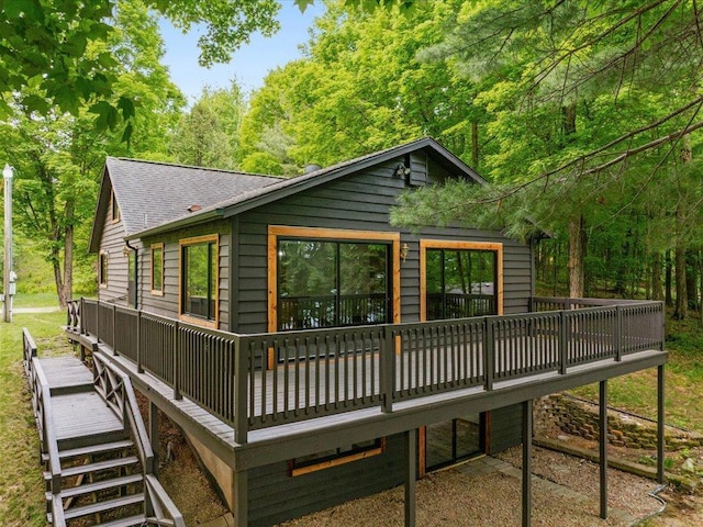 15622 Sand Beach Park, Bay Lake Twp, MN 56444 - rear view of property with a wooden deck and roof with shingles
