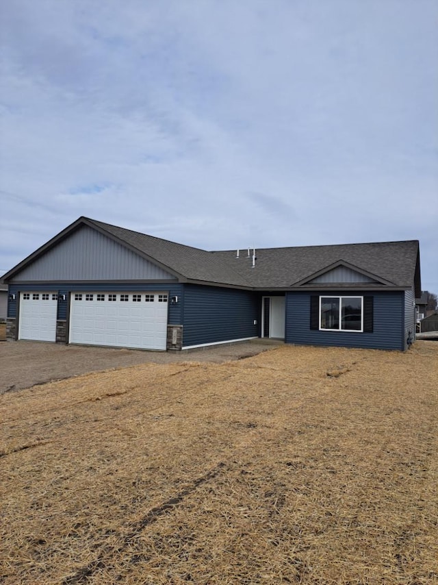 1109 9th Ave SE, Waseca, MN 56093 - ranch-style house featuring a shingled roof and an attached garage