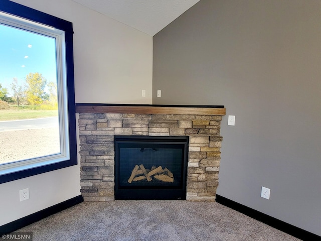1109 9th Ave SE, Waseca, MN 56093 - detailed view of baseboards, carpet flooring, and a fireplace