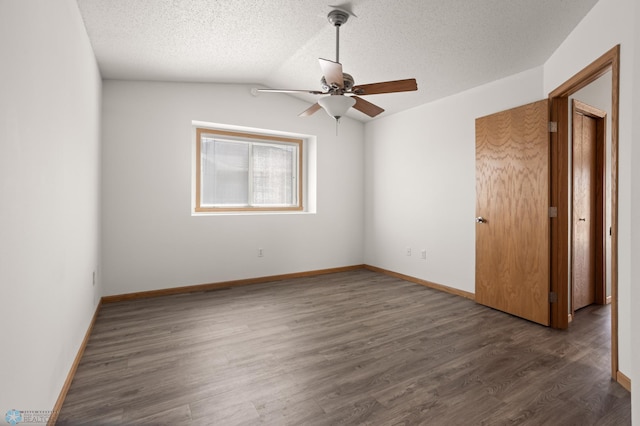 2831 Wheatland Dr S, Fargo, ND 58103 - empty room featuring ceiling fan, wood finished floors, a textured ceiling, and baseboards