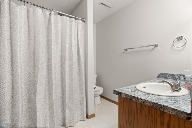 2831 Wheatland Dr S, Fargo, ND 58103 - bathroom with vanity, toilet, a textured ceiling, baseboards, and a shower with shower curtain