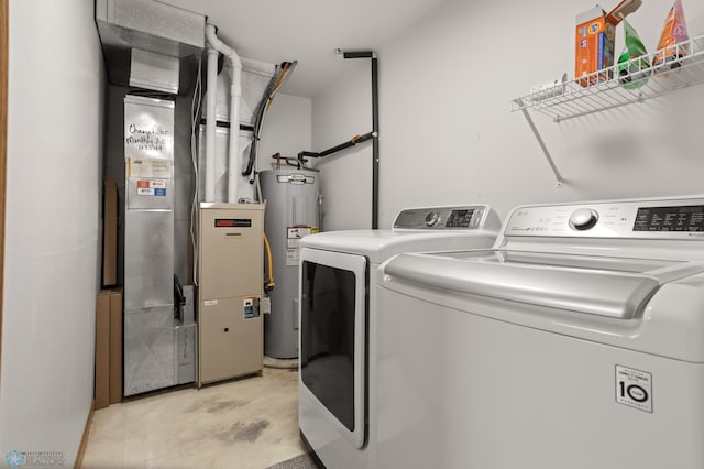 2831 Wheatland Dr S, Fargo, ND 58103 - washroom with electric water heater and washing machine and clothes dryer