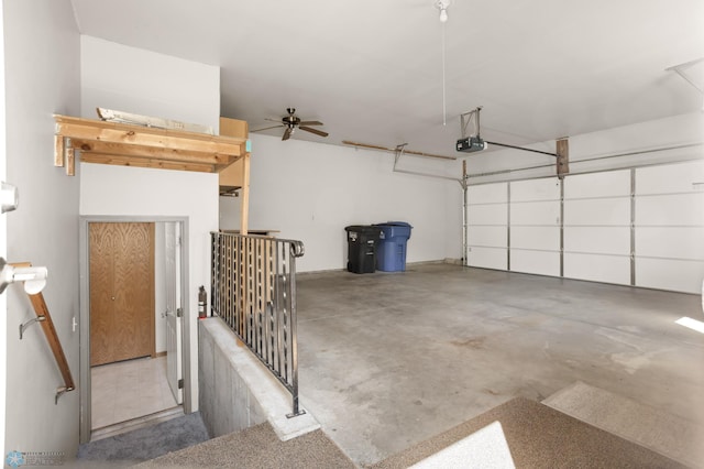 2831 Wheatland Dr S, Fargo, ND 58103 - garage featuring a garage door opener and a ceiling fan