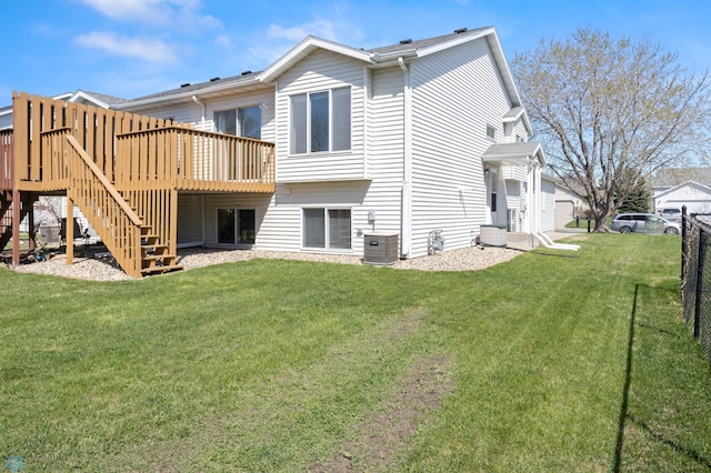 2831 Wheatland Dr S, Fargo, ND 58103 - rear view of house with a deck, stairs, and cooling unit
