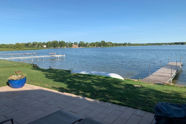 27096 Little Floyd Lake Rd Unit 1, Detroit Lakes, MN 56501 - dock featuring a lawn and a water view