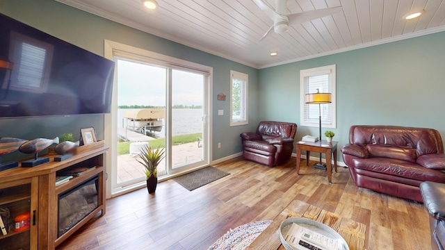 27096 Little Floyd Lake Rd Unit 1, Detroit Lakes, MN 56501 - living room featuring crown molding, a ceiling fan, recessed lighting, light wood-type flooring, and baseboards