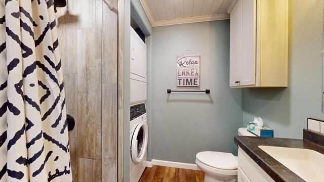 27096 Little Floyd Lake Rd Unit 1, Detroit Lakes, MN 56501 - bathroom featuring crown molding, toilet, wood finished floors, a shower with curtain, and vanity