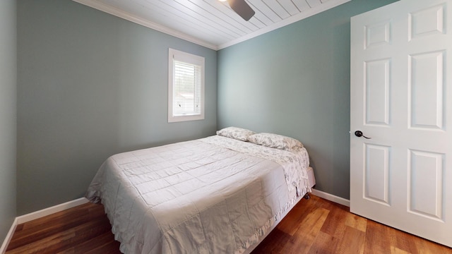 27096 Little Floyd Lake Rd Unit 1, Detroit Lakes, MN 56501 - bedroom featuring crown molding, baseboards, wood finished floors, and ceiling fan