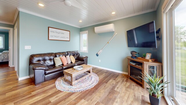 27096 Little Floyd Lake Rd Unit 1, Detroit Lakes, MN 56501 - living area featuring a wall mounted AC, crown molding, baseboards, wood finished floors, and recessed lighting