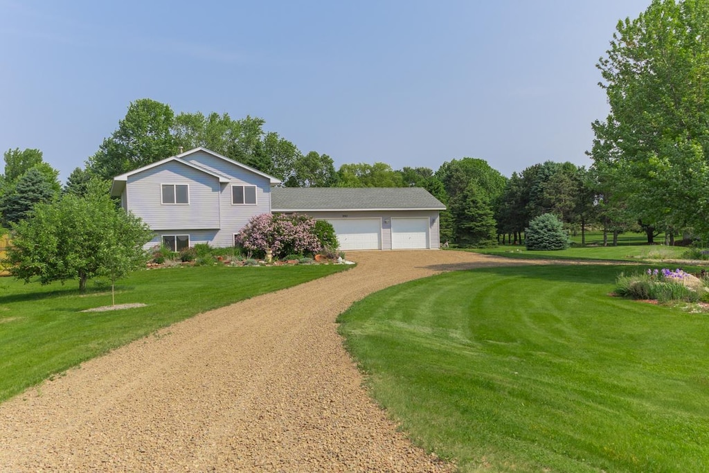 993 156th St, Hammond, WI 54015 - split level home with driveway and a front lawn