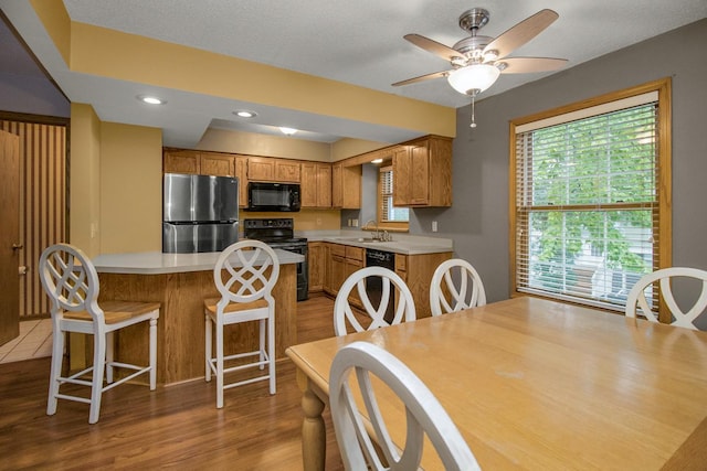 4906 Bayswater Rd, Minnetonka, MN 55345 - dining space with light wood-style floors, ceiling fan, and recessed lighting