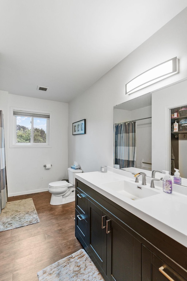 20195 Harrow Ave Way N, Forest Lake, MN 55025 - bathroom with vanity, wood finished floors, and a shower with curtain