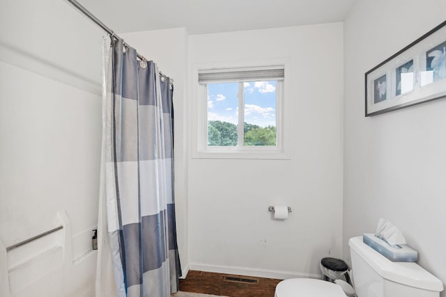 20195 Harrow Ave Way N, Forest Lake, MN 55025 - bathroom featuring curtained shower and wood finished floors