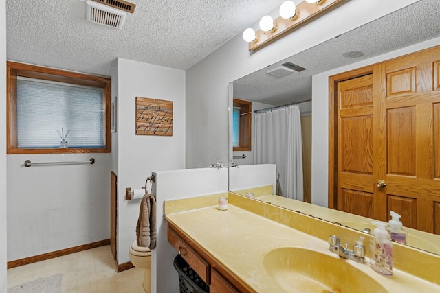 20195 Harrow Ave Way N, Forest Lake, MN 55025 - full bath featuring vanity, a textured ceiling, tile patterned floors, and a shower with shower curtain