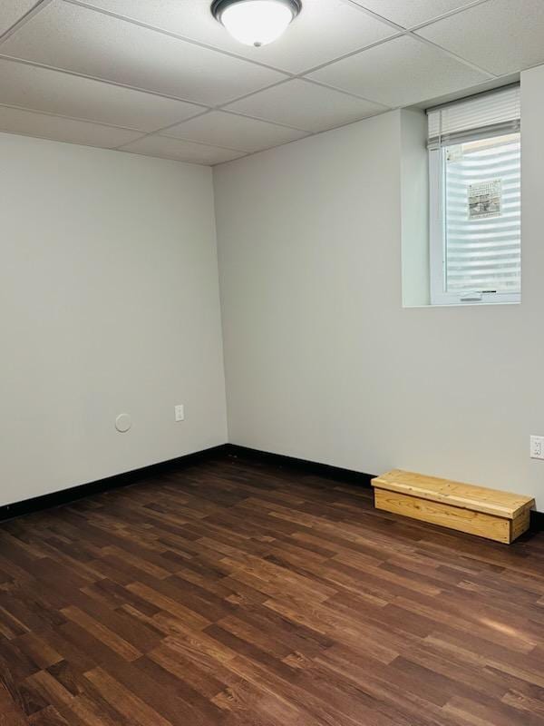 98 Magnolia Ave W, Saint Paul, MN 55117 - empty room featuring dark wood-style flooring and baseboards