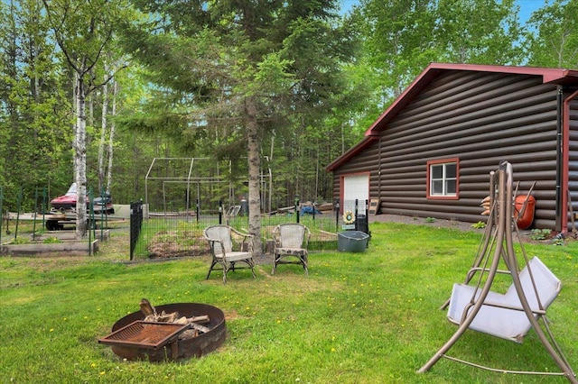 4985 Sam Anderson Rd, Amnicon Twp, WI 54874 - view of yard with a fire pit