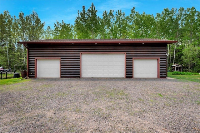 4985 Sam Anderson Rd, Amnicon Twp, WI 54874 - detached garage featuring central AC unit