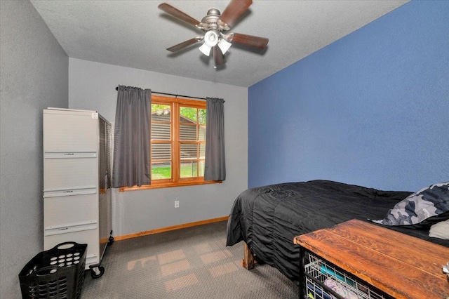4985 Sam Anderson Rd, Amnicon Twp, WI 54874 - bedroom featuring carpet floors, baseboards, and ceiling fan