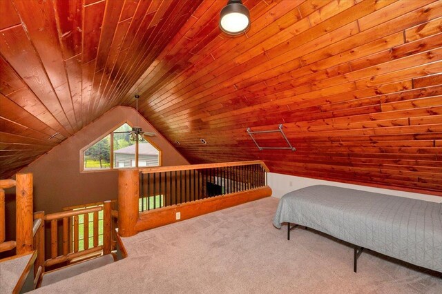 4985 Sam Anderson Rd, Amnicon Twp, WI 54874 - carpeted bedroom featuring wooden ceiling and lofted ceiling