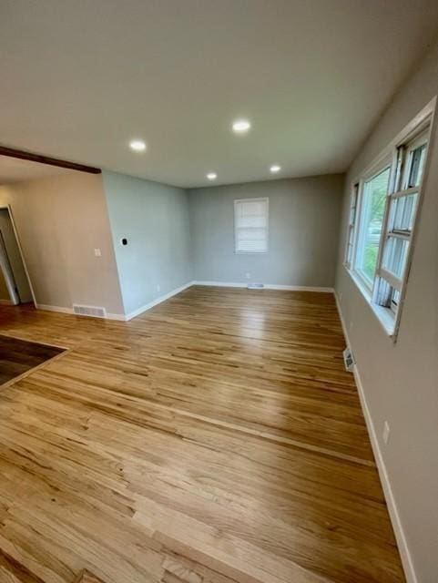 4155 7th St, Goodview, MN 55987 - spare room with light wood finished floors, healthy amount of natural light, baseboards, and recessed lighting